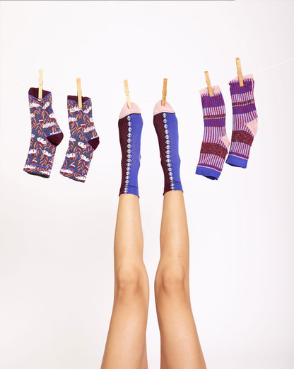 Calze con fantasia a coccinelle da donna di Arturo Stories. 