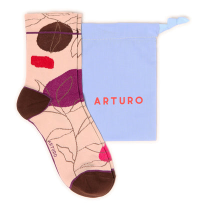 Calzini con fantasia astratta rossi e crema di Arturo Stories.