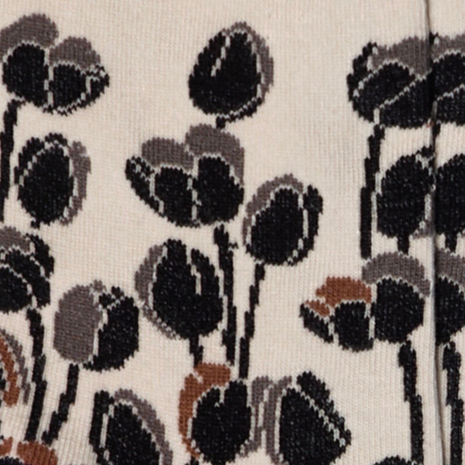 Dettaglio dei calzini con tulipani bianco perla da donna di Arturo Stories.